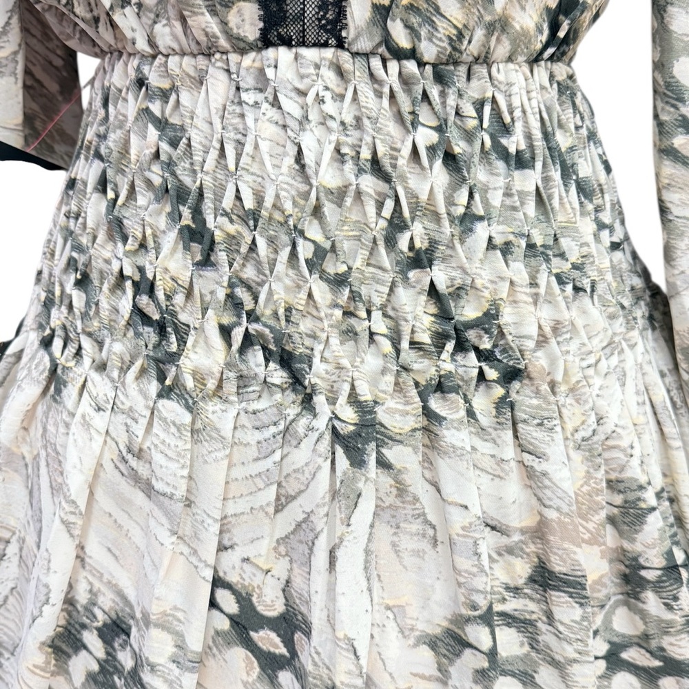 BEBE Dress with plenty smocking on shoulders , sleeves and yoke of the skirt. - Picture 2 of 9